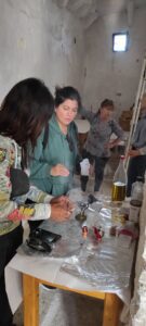 lighting up a candel at hagia theodoti church